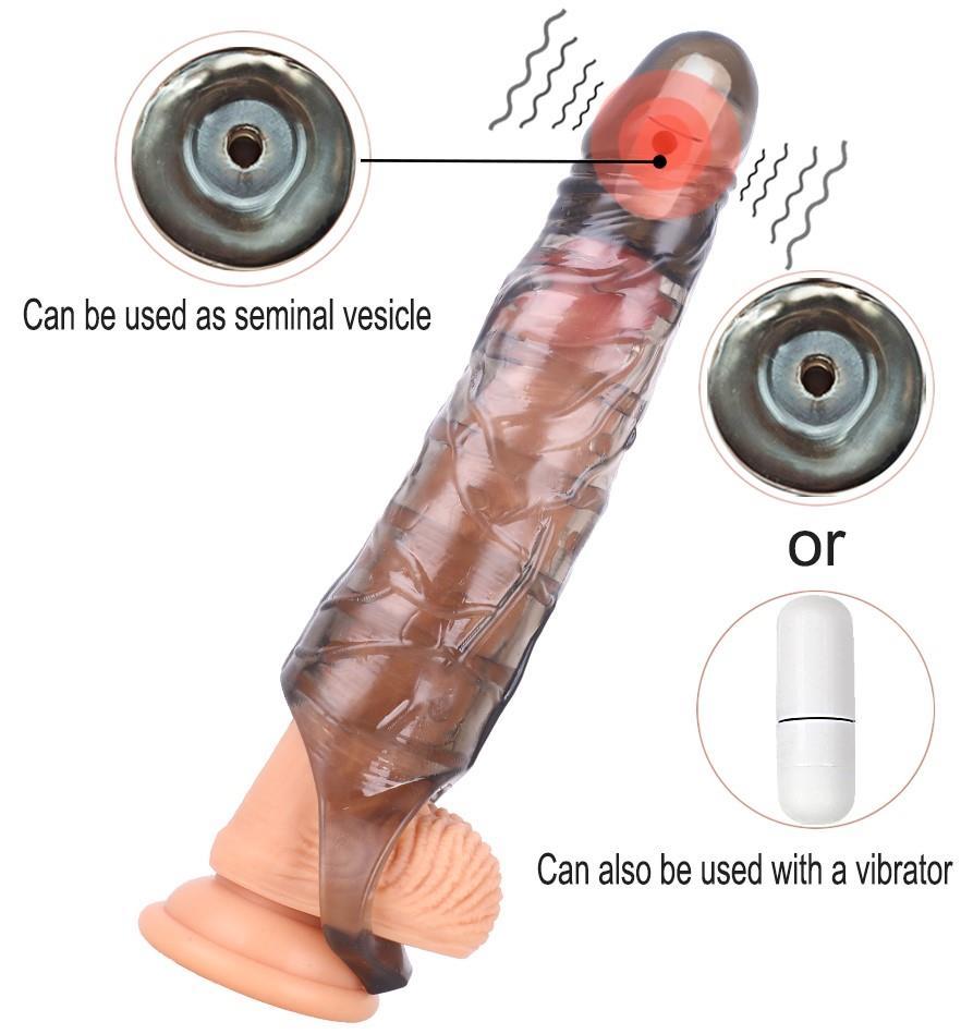 Güçlü Titreşimli Silikon Dokuda Uzatmalı 6 Cm Dolgulu 25 Cm Testis Tutacaklı Büyük Boy Penis Kılıfı